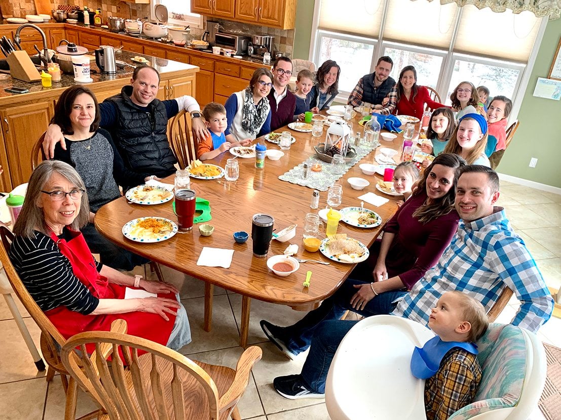 Family At The Dining Room Table